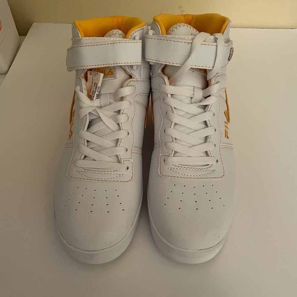 New women white and yellow Fila high top